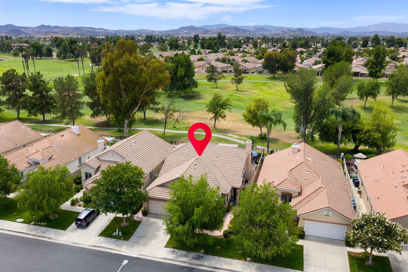Aerial view of 29383 Hidden Lake Dr backing onto the Menifee Lakes golf course in The Oasis, sold at full asking by The Hertz Group in 2026